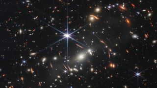 field of stars and warped galaxies