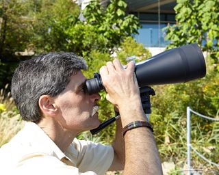 With a quickly adjustable center focus ring, Orion's Astronomy 20x80 can also be used for daylight terrestrial views. Here, the author checks out architectural details on a distant bridge.