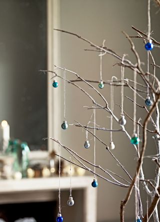 picture of decorated tree made out of twigs