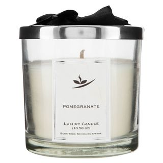 pomegranate candle with fresh on candle