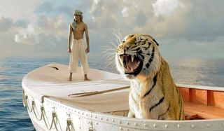 Life of PI Suraj Sharma looking onto the sea with his tiger