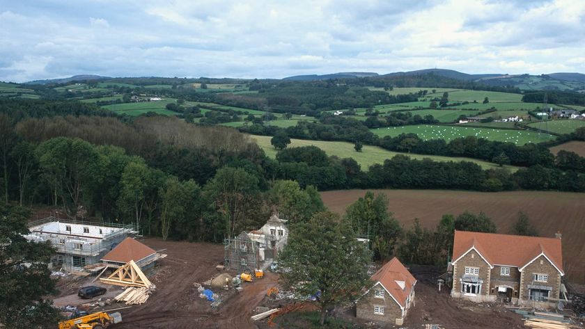 Construction of new detached houses with conversion of stable block to house nearby. Wales