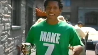 Orlando Jones shows off his t-shirt on the street in 7-Up.