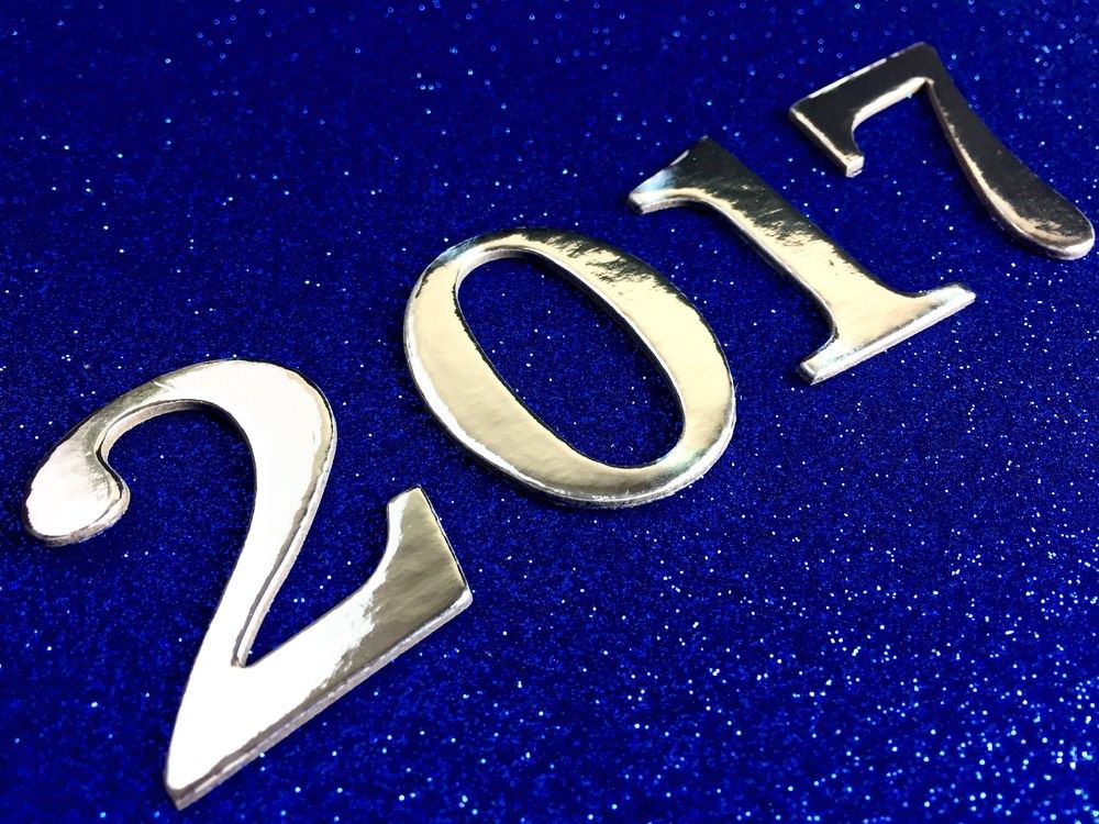 Silver 2017 on a festive blue glittery background