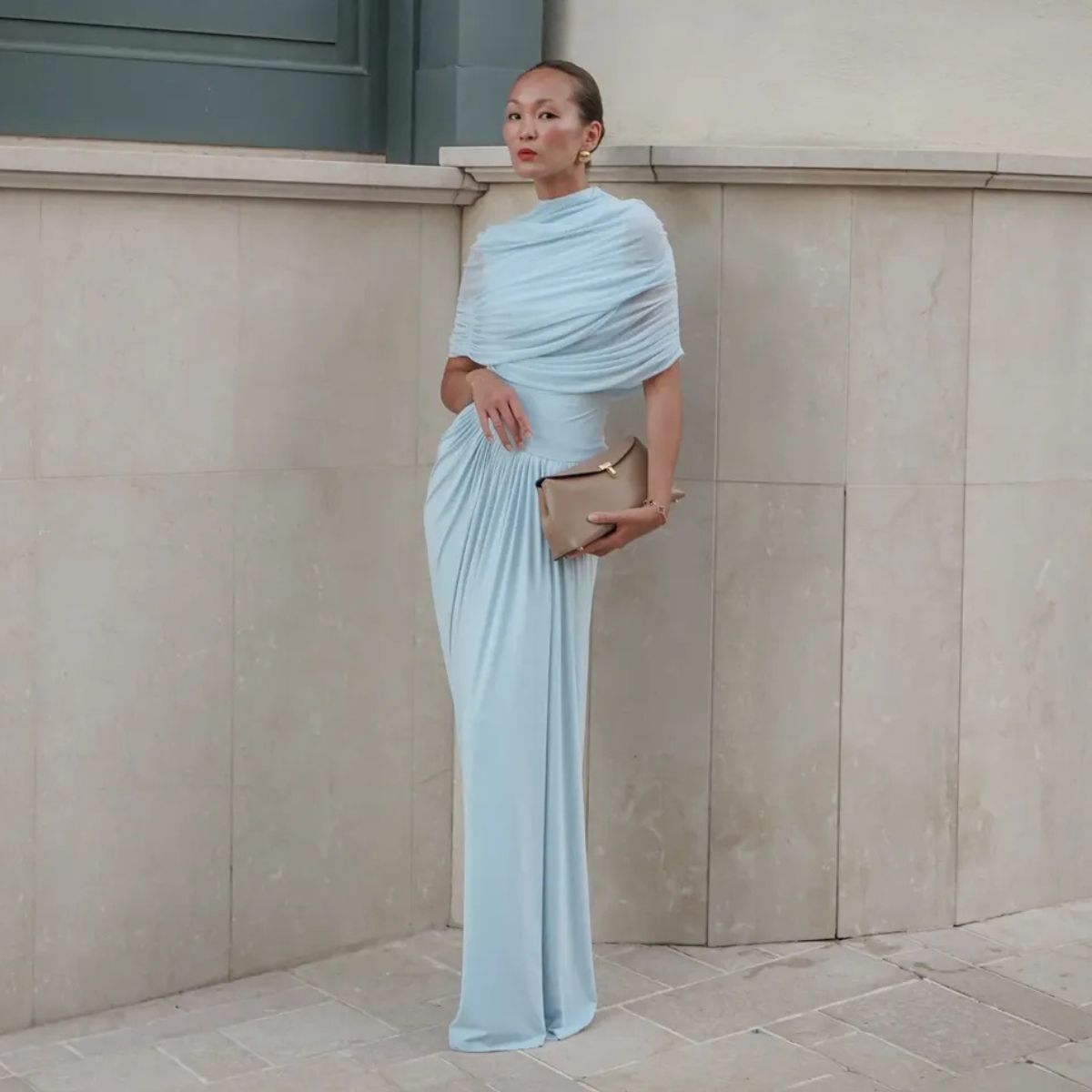 mariko nakafuji wearing a blue wedding guest dress