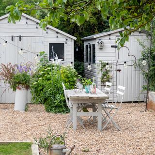 farmhouse with modern extension decorated in shades of grey and white