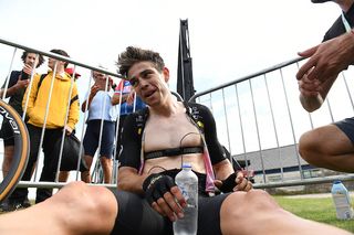 Wout van Aert recovers after his stage winning effort at Tour of Britain