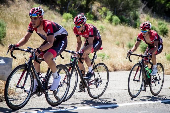 Jamis gets organized to launch an attack on the final climb