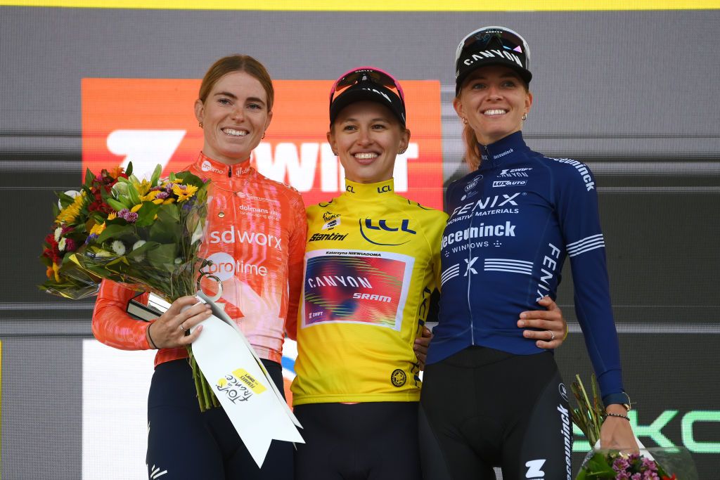 ALPE DHUEZ FRANCE AUGUST 18 LR Demi Vollering of The Netherlands and Team SD Worx Protime on second place overall race winner Katarzyna Niewiadoma of Poland and Team CanyonSRAM Racing Yellow Leader Jersey and Pauliena Rooijakkers of The Netherlands and Team FenixDeceuninck on third place pose on the podium ceremony after the 3rd Tour de France Femmes 2024 Stage 8 a 1499km stage from Le GrandBornand to Alpe dHuez 1828m UCIWWT on August 18 2024 in Alpe dHuez France Photo by Alex BroadwayGetty Images