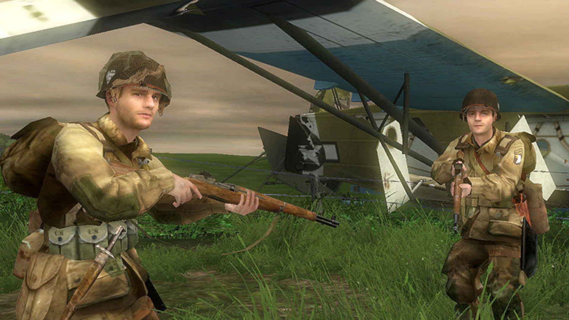 Two soldiers holding guns during one of the best Gearbox games, Brothers in Arms: Road to Hill 30