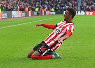 Amad Diallo of Sunderland celebrates scoring his team's first goal during the Sky Bet Championship between Sunderland and Millwall at Stadium of Light on December 3, 2022 in Sunderland, United Kingdom.