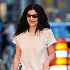Lorde wearing a tan T-shirt and sunglasses in NYC 