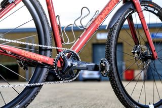 Image shows the chain ring of a gravel bike.