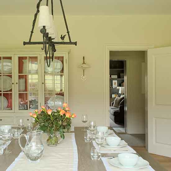 dining area with dining table and oak dining chairs and pendant lights
