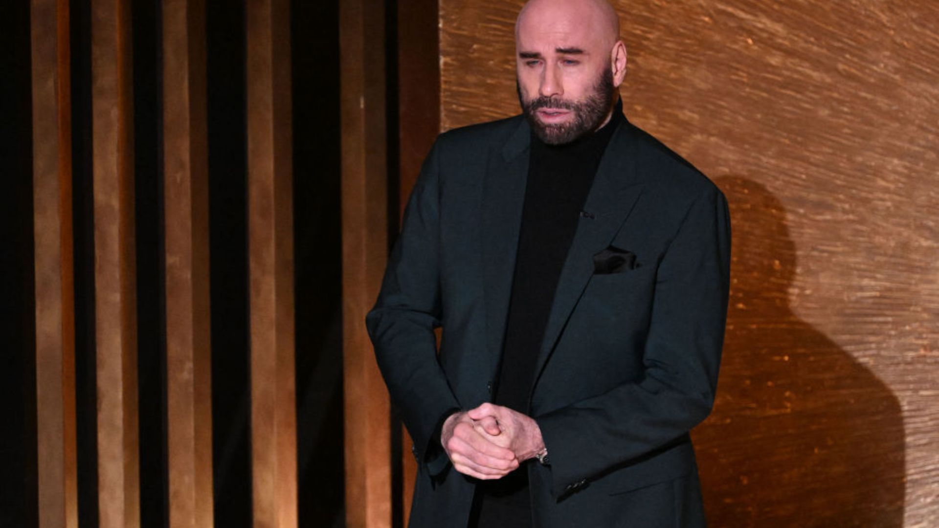 John Travolta presenting at the Oscars 2023