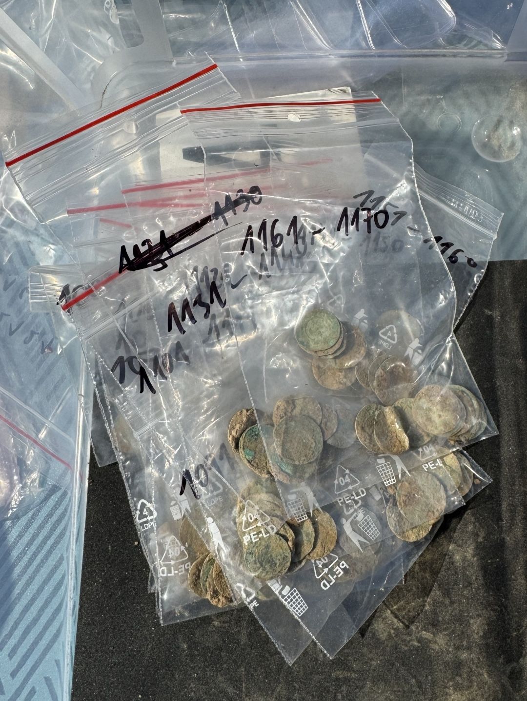 silver coins in plastic bags