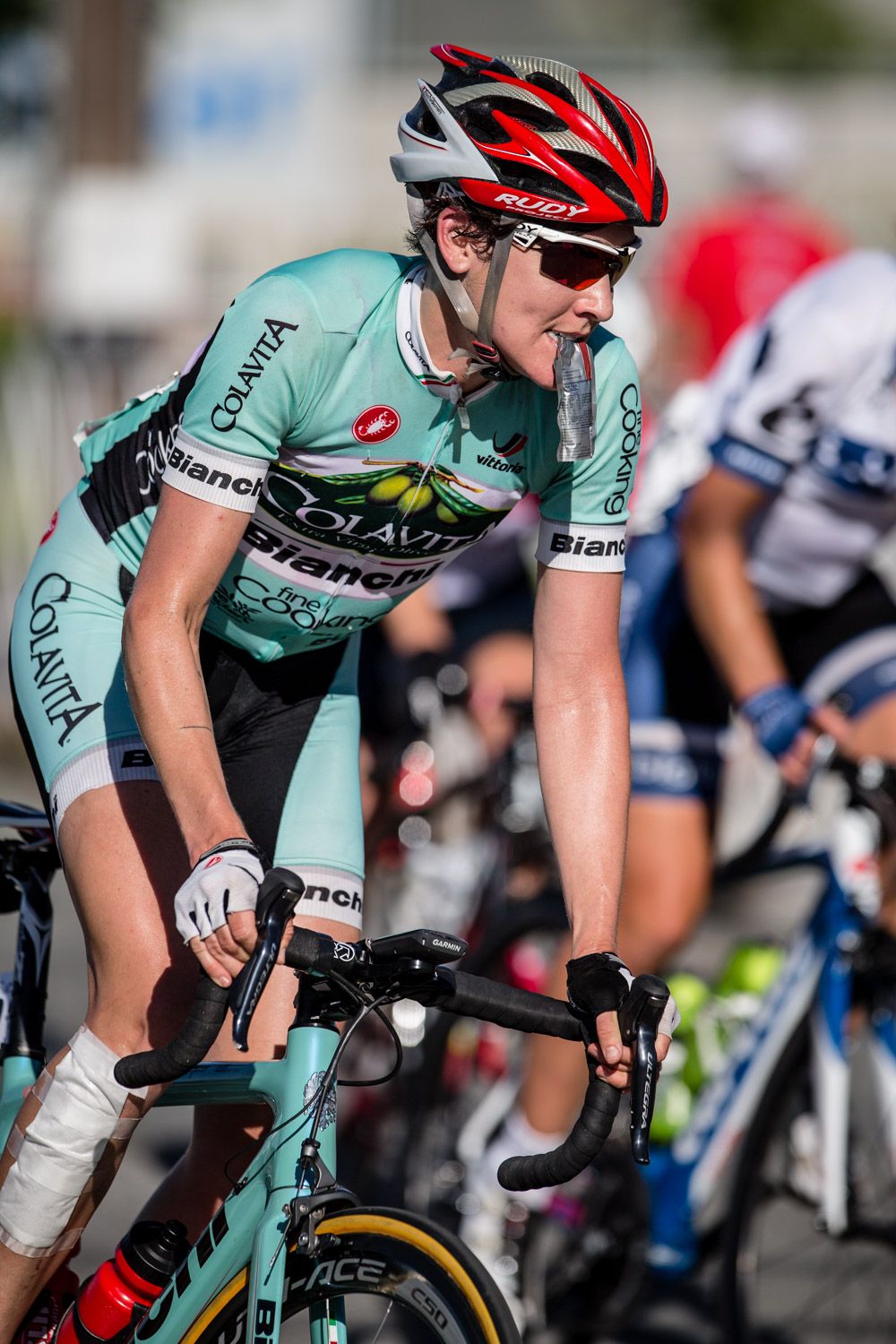 Katie Donovan (Colavita) has a snack going into the final laps.
