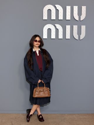 Ariana Greenblatt at the Spring Summer 2025 Miu Miu show during Paris Fashion Week.