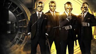 Payday 2 heisters in nice suits and gold masks
