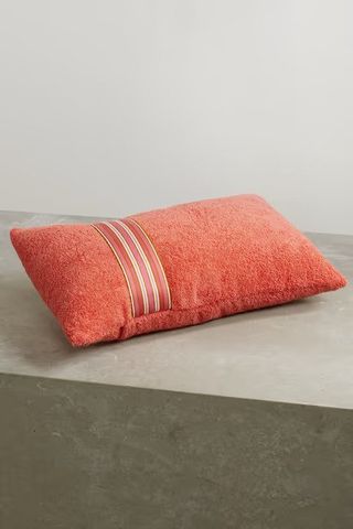 A long orange pillow