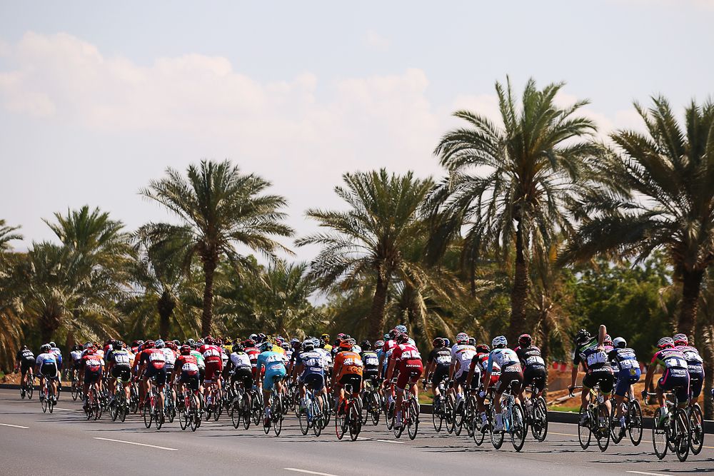 The peloton passes through the outskirts of Muscat during stage two of the 2016 Tour of Oman
