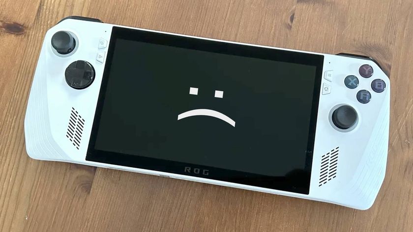 Asus ROG Ally with sad text face on screen.