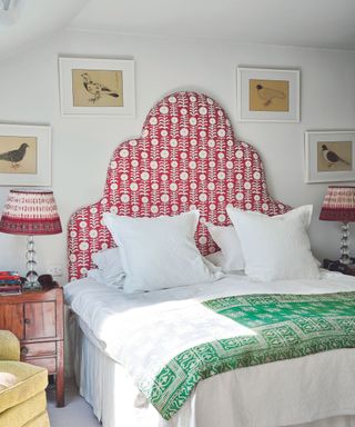 Bedroom with red patterned headboard