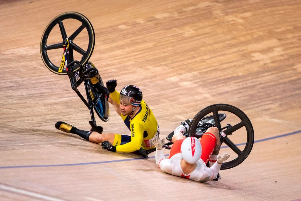 Thailands Jai Angsuthasawit L and Polands Krzysztof Maksel crash during the Kerin quarter final race at the UCI track cycling World Championship at the velodrome in Berlin on February 27 2020 Photo by Odd ANDERSEN AFP Photo by ODD ANDERSENAFP via Getty Images