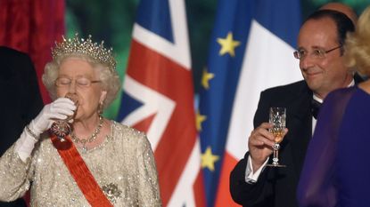 French President Francois Hollande and Queen Elizabeth ll enjoy toasting each other during a State Banquet at the Elysee Palace on June 6, 2014 in Paris, France.