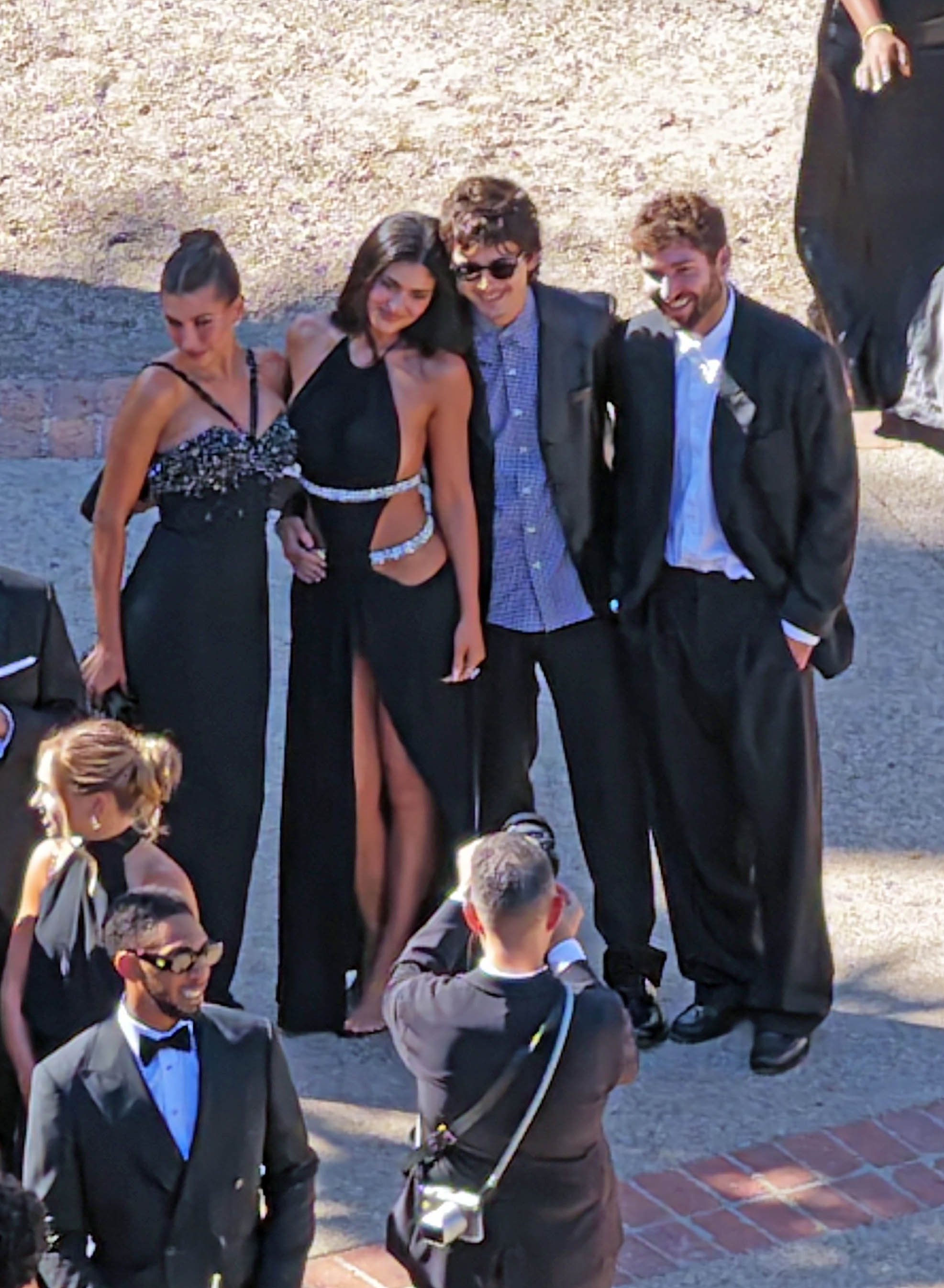 Hailey Bieber and Kylie Jenner styled different black-tie wedding guest dresses for Jordyn Woods's ceremony