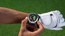 HUAWEI GPS golf watch on a man's hand