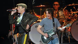 (from left) David Lee Roth, Eddie Van Halen and Alex Van Halen perform at Madison Square Garden on March 1, 2012 in New York City