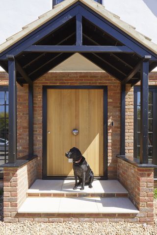 large porch with brick walls