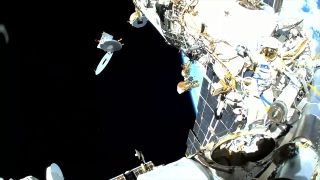 Expedition 65 flight engineer Oleg Novitskiy jettisoned a disc-shaped cable reel lid and piece of multi-layer insulation at the end of his and cosmonaut Pytor Dubrov’s spacewalk outside the International Space Station on Thursday, Sept. 9, 2021.