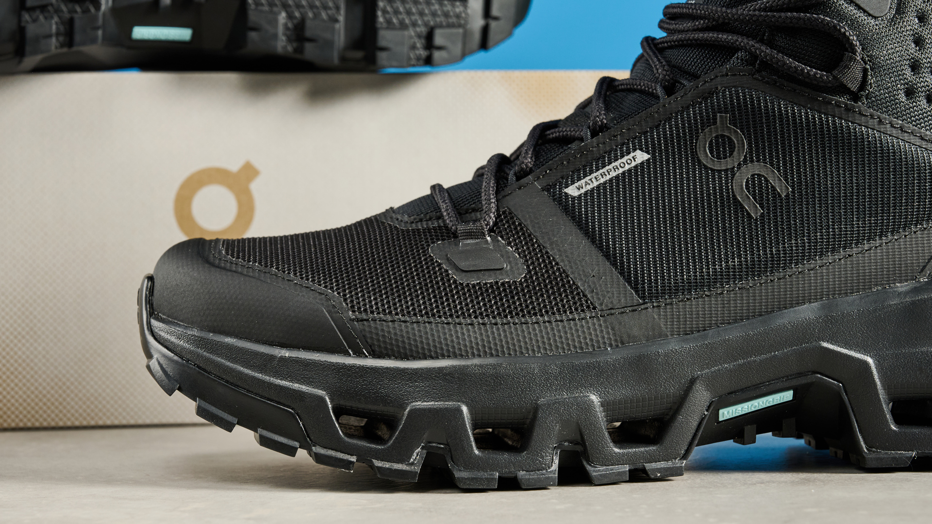 The On Cloudrock Mid WP boots showing the sole and mudguard
