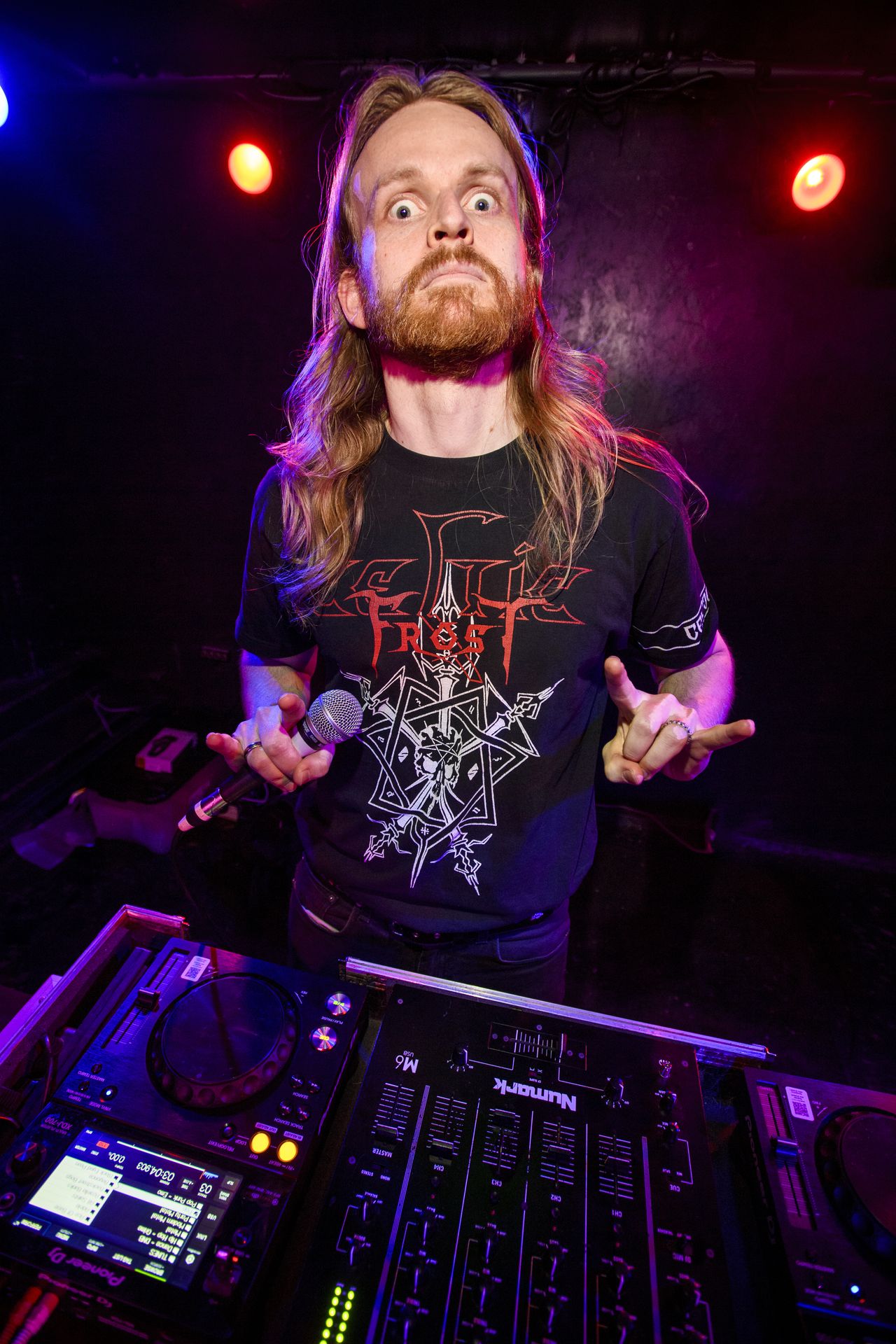 DJ Sammy on the decks throwing horns