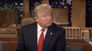 Donald Trump looking at Jimmy Fallon while on The Tonight Show