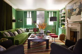 A dark green room in a Brooklyn Brownstone house