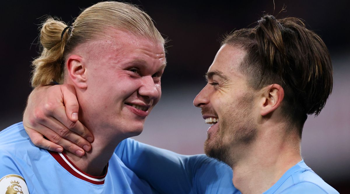 Erling Haaland and Jack Grealish celebrate their team&#039;s win in the Premier League match between Arsenal and Manchester City at the Emirates Stadium on February 15, 2023 in London, England.