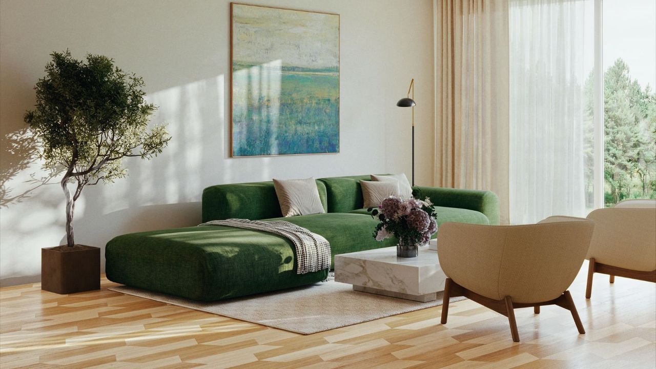 Modern living room with vinyl floor, green sofa, two armchairs, rug and marble coffee table in front of painting and wall-to-wall windows.