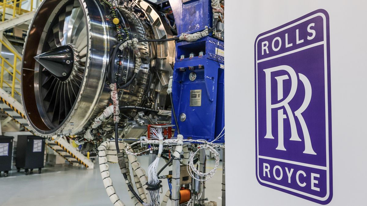 The Rolls-Royce logo next to a jet engine