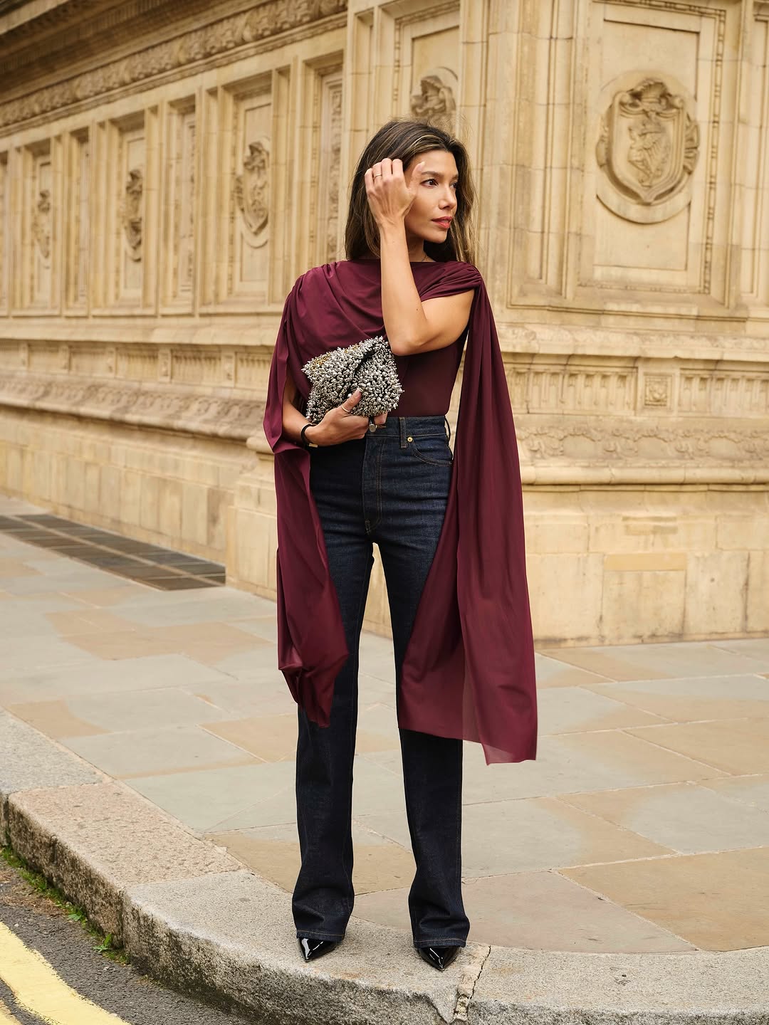 woman wearing holiday denim outfit 2025