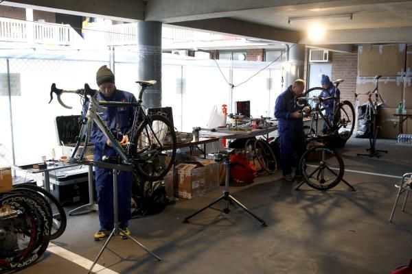The Italian mechanics work on the bikes