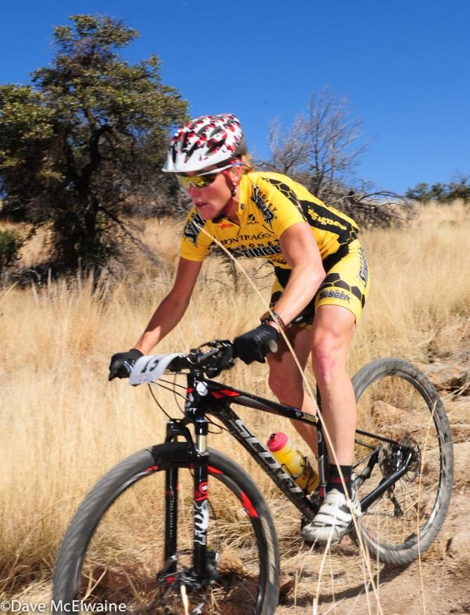 Jaime Brede (Honey Stinger/Bontrager) descending on lap one