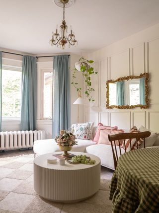 Parisian style flat with white walls and a ceiling rose on the light fixture