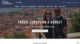 SavvyBackpacker homepage of a photo of a couple standing in front of a European city