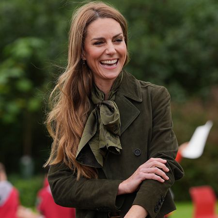 WINDSOR, ENGLAND - SEPTEMBER 18: U.S. First Lady Melania Trump (R) and Catherine, Princess of Wales (L) meet members of the Scouts' Squirrels programme as they tour the grounds of Frogmore Cottage, during the State visit by the President of the United States of America and U.S. First Lady Melania Trump, on September 18, 2025 in Windsor, England. (Photo by Yui Mok - WPA Pool/Getty Images)