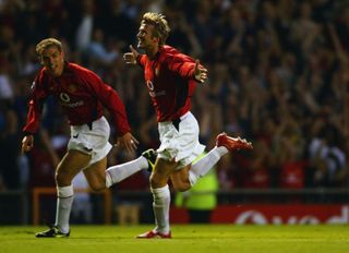 David Beckham celebrates after scoring for Manchester United against Zalaegerszeg at Old Trafford in 2002.