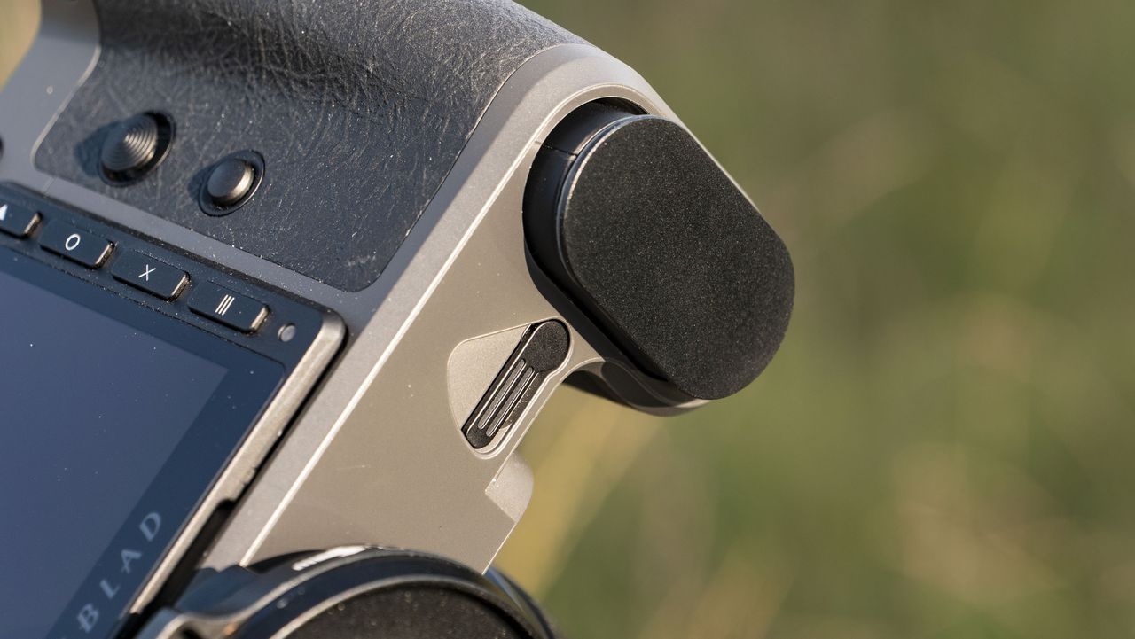 Battery door of the Hasselblad X2D II 100C camera outdoors at first light