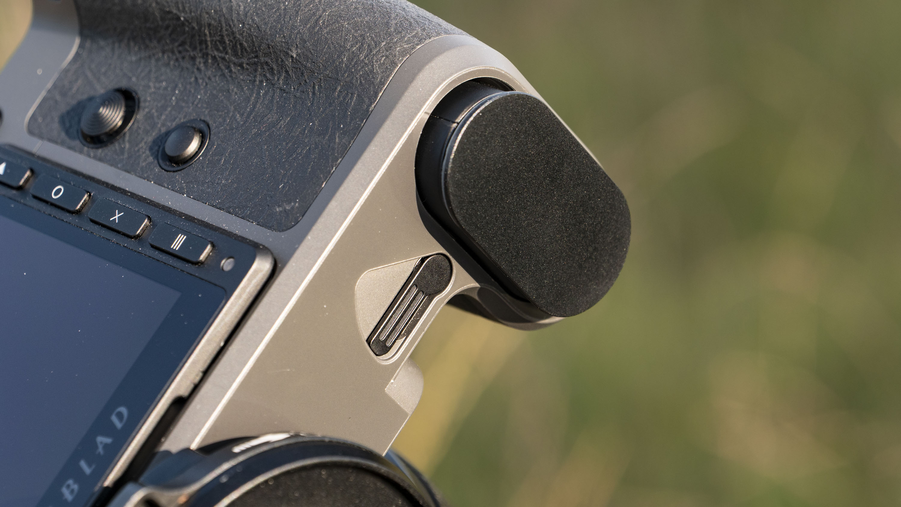 Battery door of the Hasselblad X2D II 100C camera outdoors at first light
